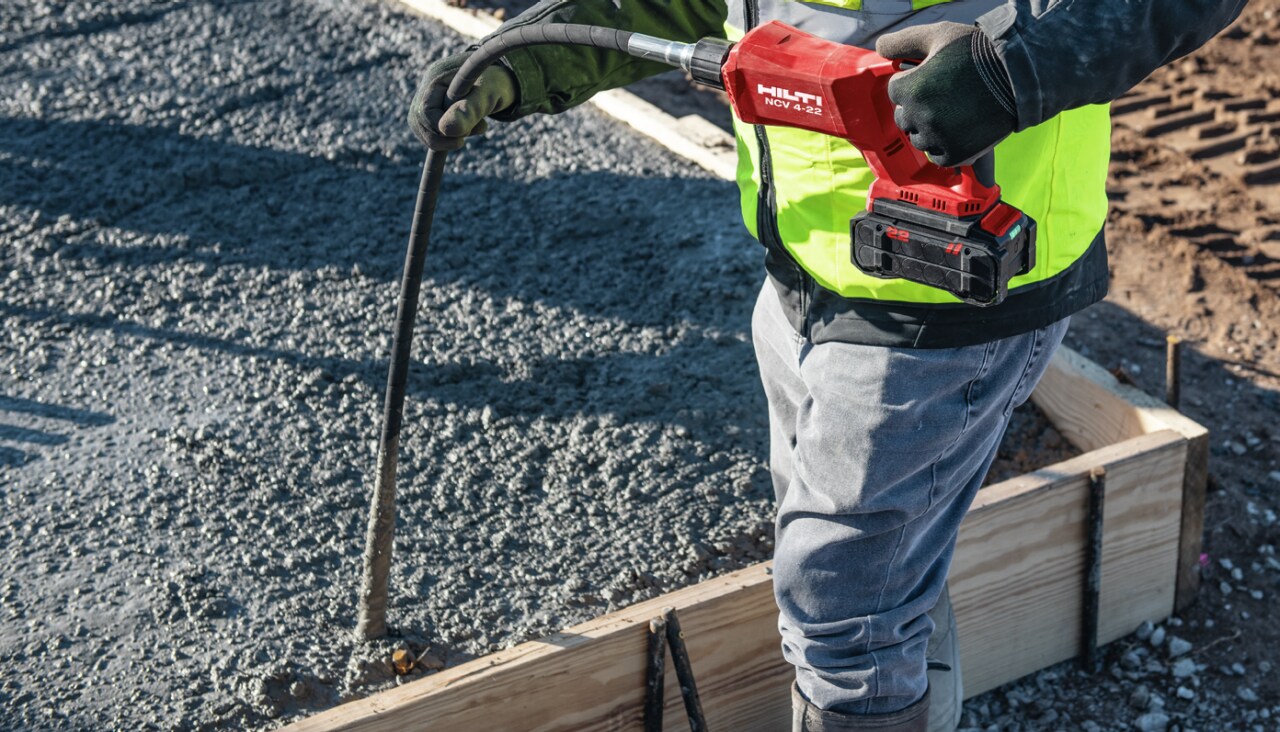 worker using NCV 4-22 during concrete pour